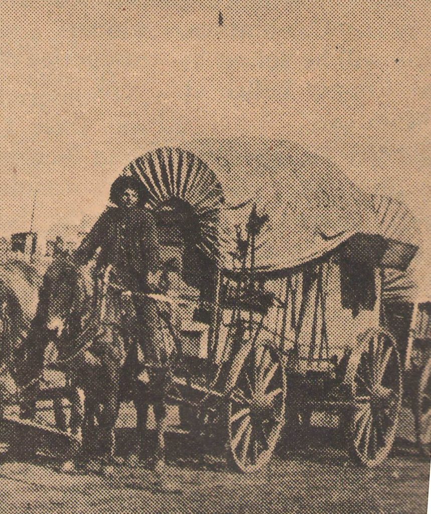 Pat Hennessey and his mule driven covered wagon on the Chisholm Trail