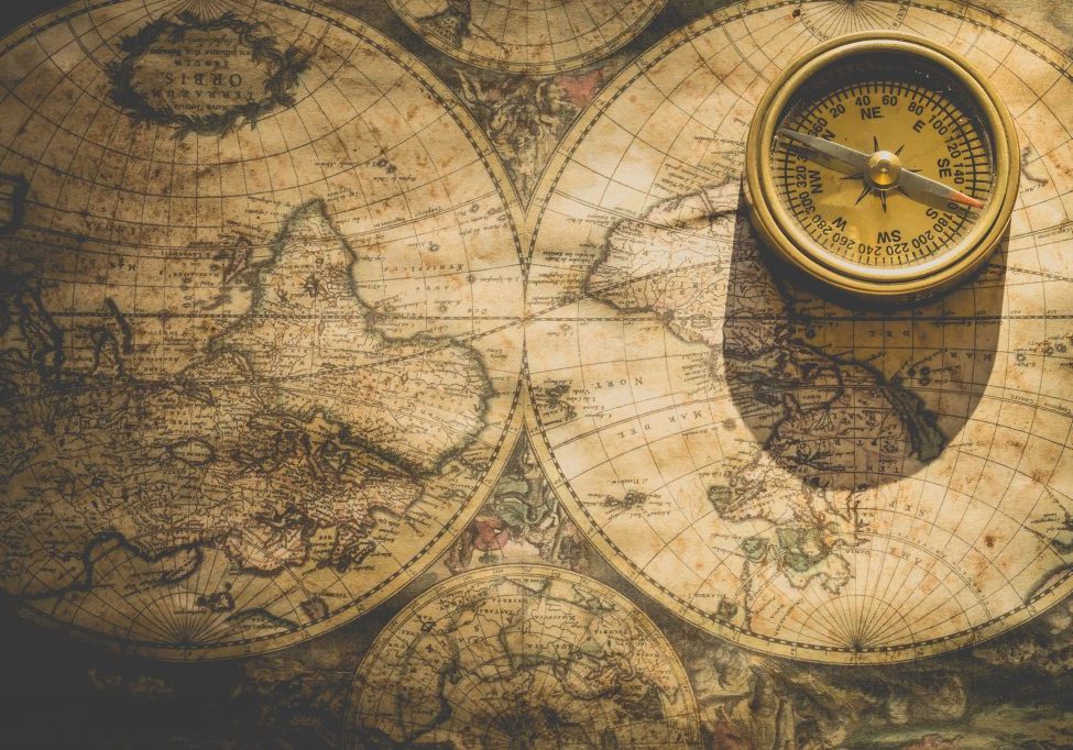 a compass and map